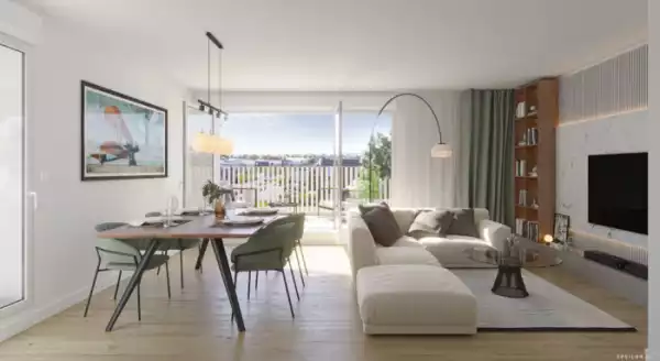 Perspective 3D d'un salon, salla à manger lumineux et moderne. Un espace ouvert, grande baie vitrée donnant sur le balcon. Le salon est aménagé avec un grand canapé d'angle de couleur claire, une table basse en verre et un tapis douillet. Une bibliothèque en bois encastrée et un meuble TV en béton ciré apportent une touche contemporaine.