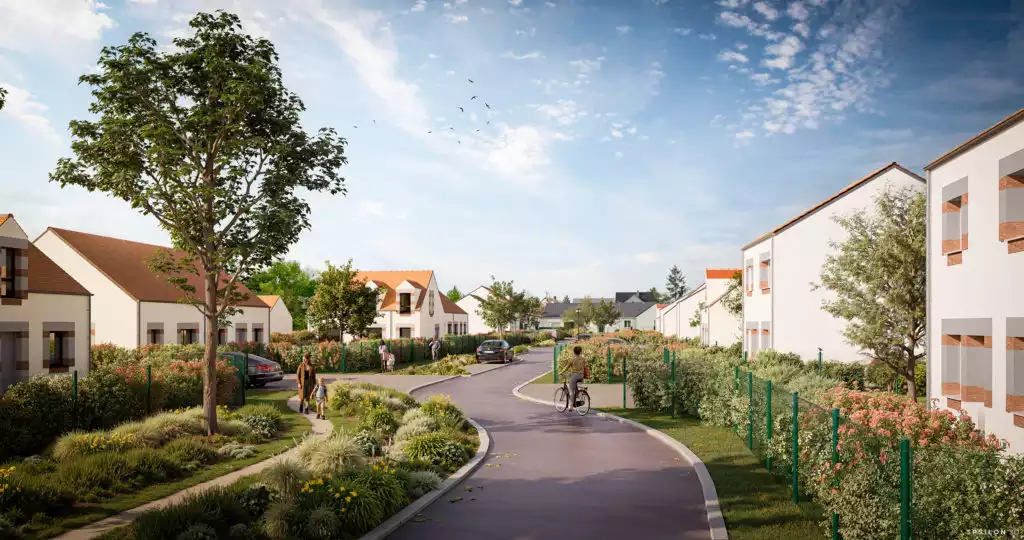 On y découvre une voie de circulation partagée aux courbes douces, bordée de maisons blanches aux toitures traditionnelles et de jardins fleuris protégés par des grillages. L'accent est mis sur la végétalisation et la mobilité douce, avec la présence de piétons, d'un cycliste et de larges massifs plantés qui créent une atmosphère résidentielle paisible et accueillante.