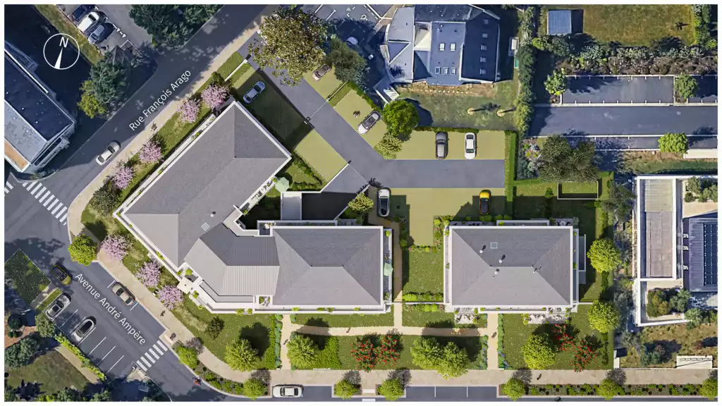 Le plan-masse en vue aérienne souligne une insertion urbaine harmonieuse, révélant une architecture élégante avec des toitures en zinc et de vastes espaces verts paysagers.