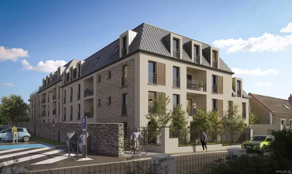 Vue d'angle de la résidence depuis la rue. Une architecture élégante mariant des enduits clairs, du parement en pierre naturelle, du bardage bois au niveau des volets et une toiture mansardée en zinc et ardoise.