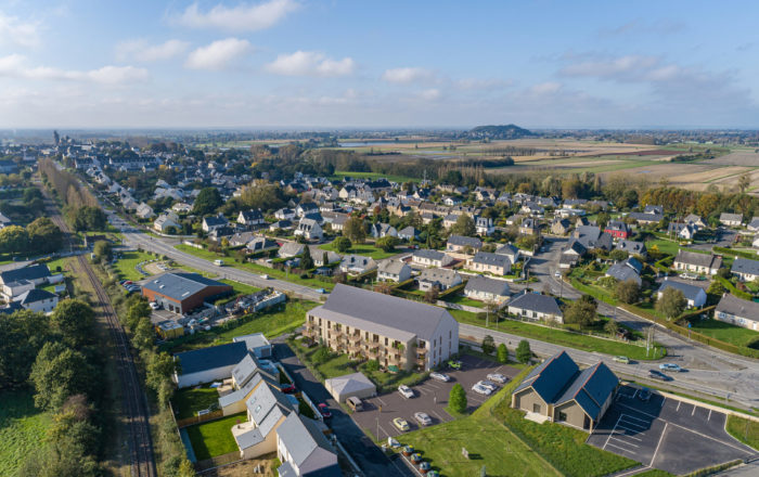 vue axonométrique 3D d'un bâtiment d'habitation intégré dans son environnement existant