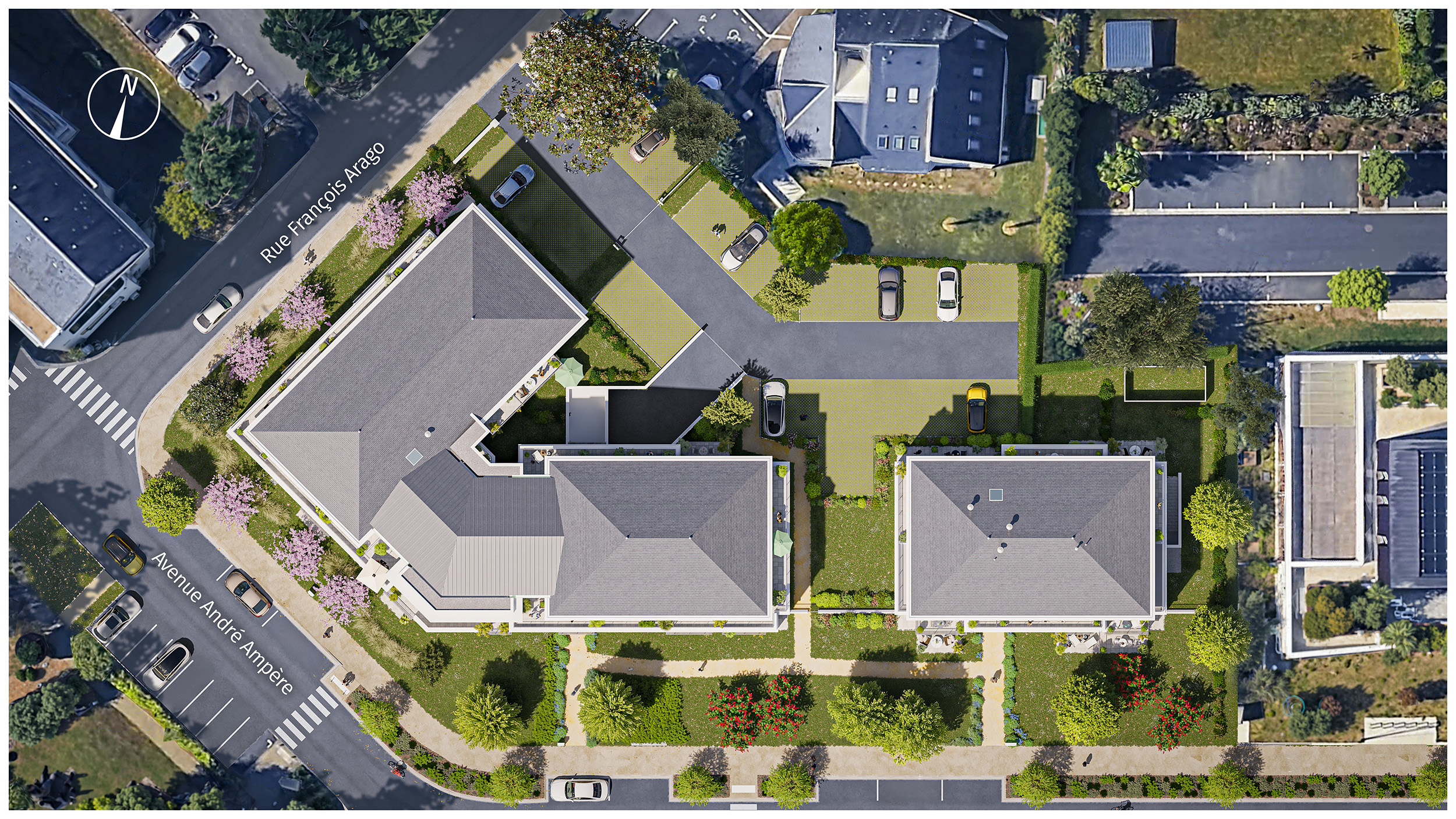 Le plan-masse en vue aérienne souligne une insertion urbaine harmonieuse, révélant une architecture élégante avec des toitures en zinc et de vastes espaces verts paysagers.